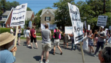 Protesting an evicting slumlord at his Cleveland Park home